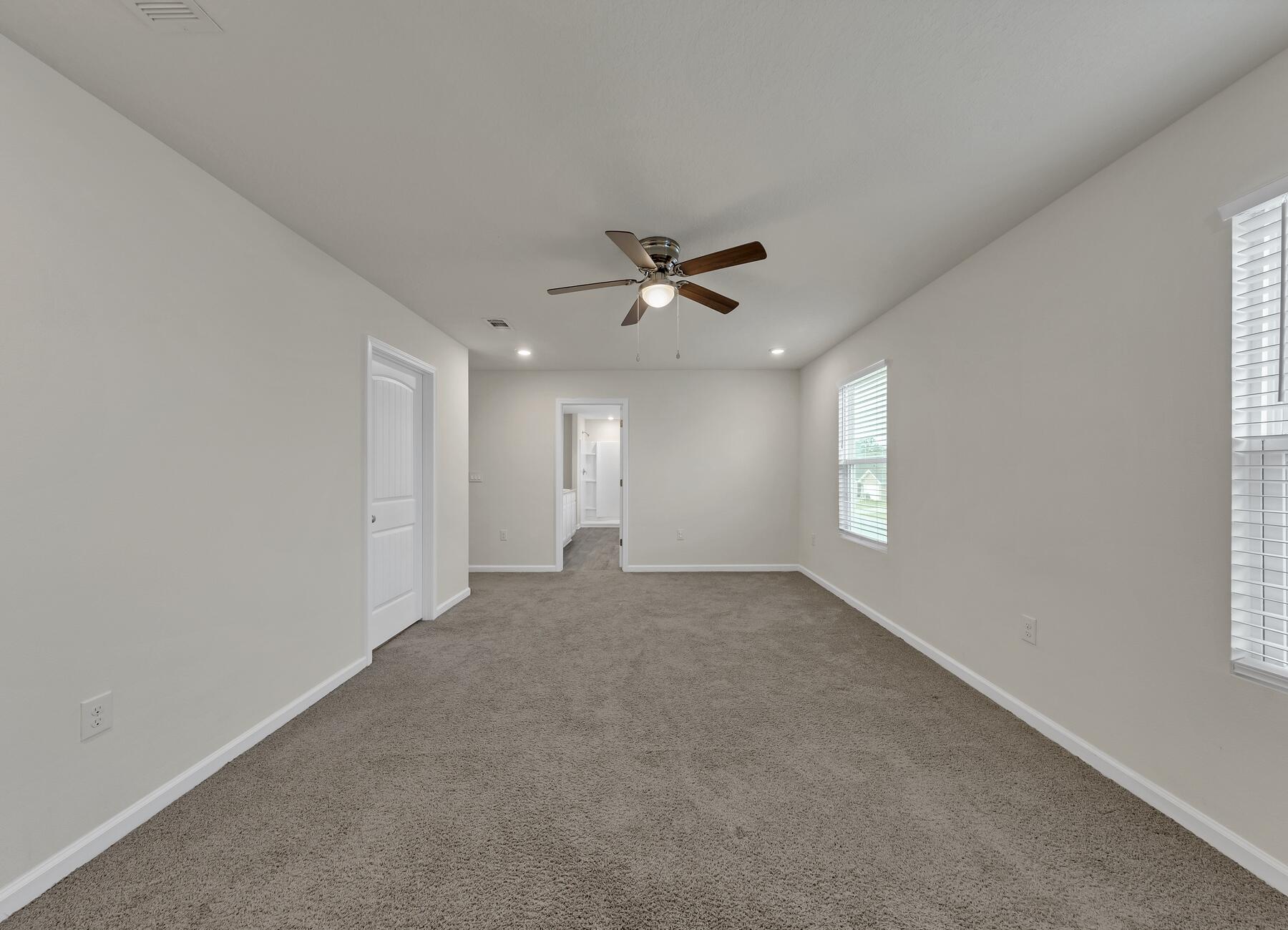 925 Merganser Way Crestview, FL 32539 - Photo 23 of 37 a view of a livingroom with a ceiling fan and window