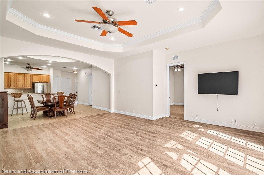 5224 Haw Branch Road Sebring, FL 33875 - Photo 10 of 40 a view of a livingroom with furniture and a flat screen tv