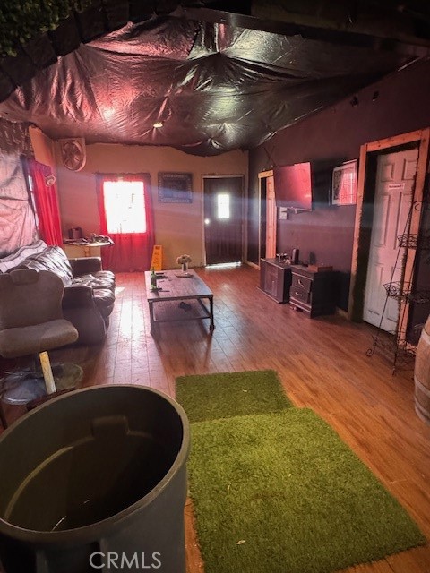 125 East O Street Colton, CA 92324 - Photo 8 of 17 a living room with furniture and a fireplace