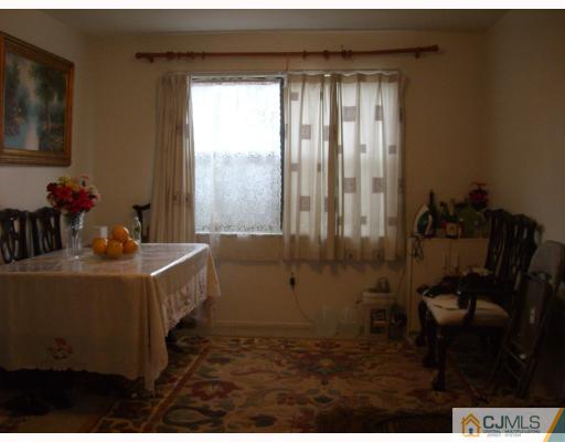 1902 Raspberry Court Edison, NJ 08817 - Photo 3 of 6 a living room with furniture and a window