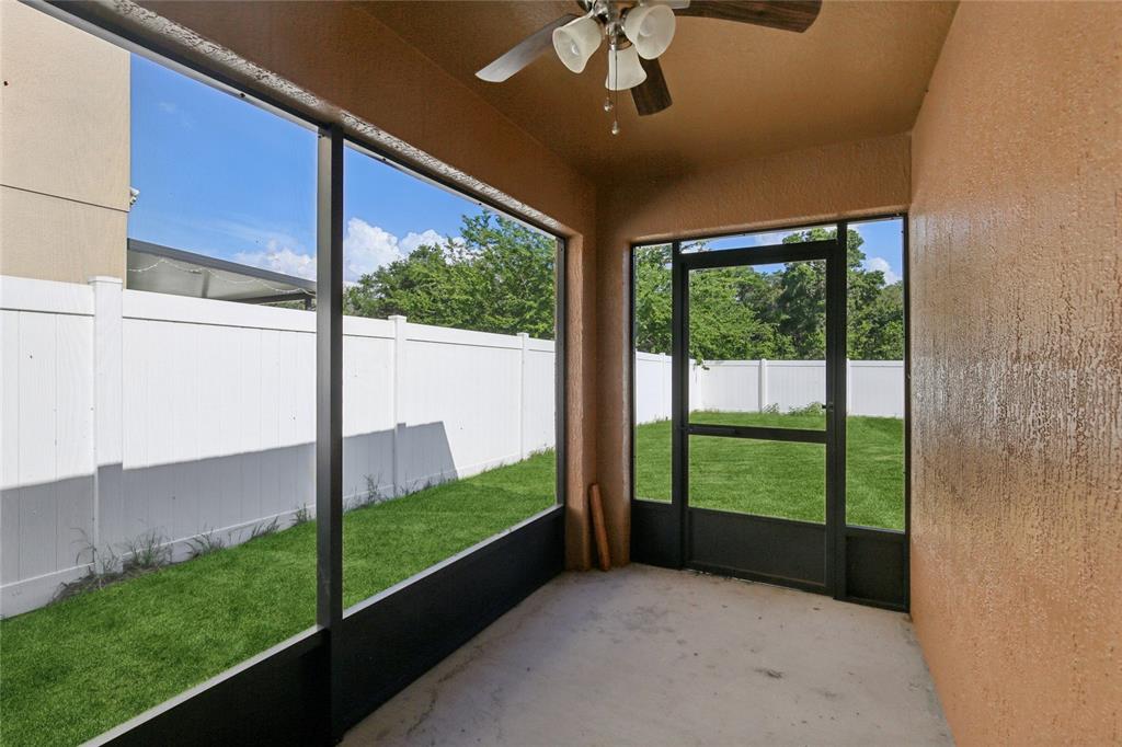 109 James Circle Lake Alfred, FL 33850 - Photo 16 of 17 a view of outdoor space with sliding door and garden view