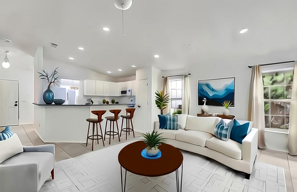 109 James Circle Lake Alfred, FL 33850 - Photo 3 of 17 a living room with furniture and a view of kitchen