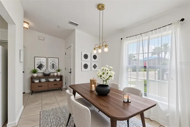 a living room with furniture and a table