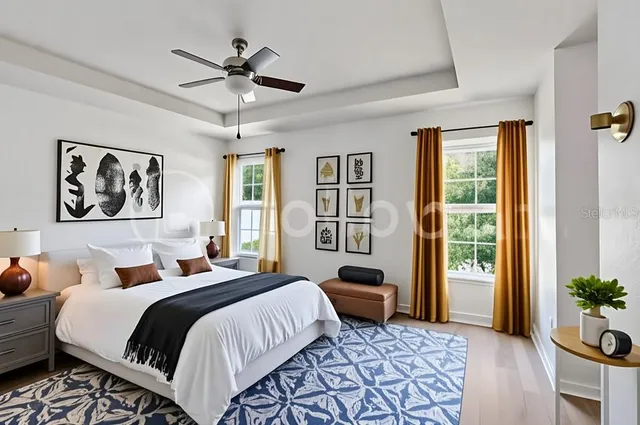 a bedroom with a bed furniture and window