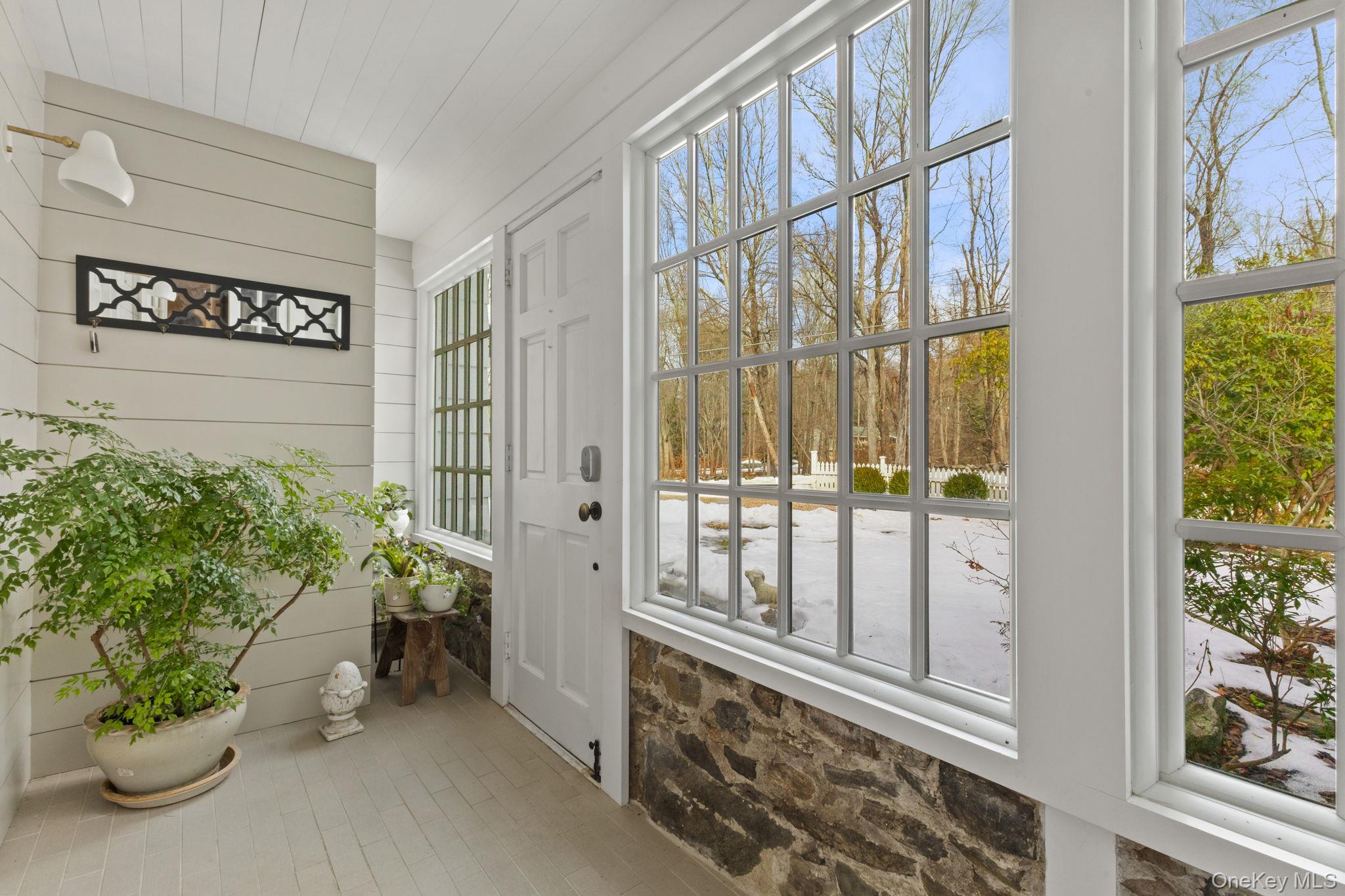 8 South Bedford Road Pound Ridge, NY 10576 - Photo 8 of 32 a view of a entryway door of the house