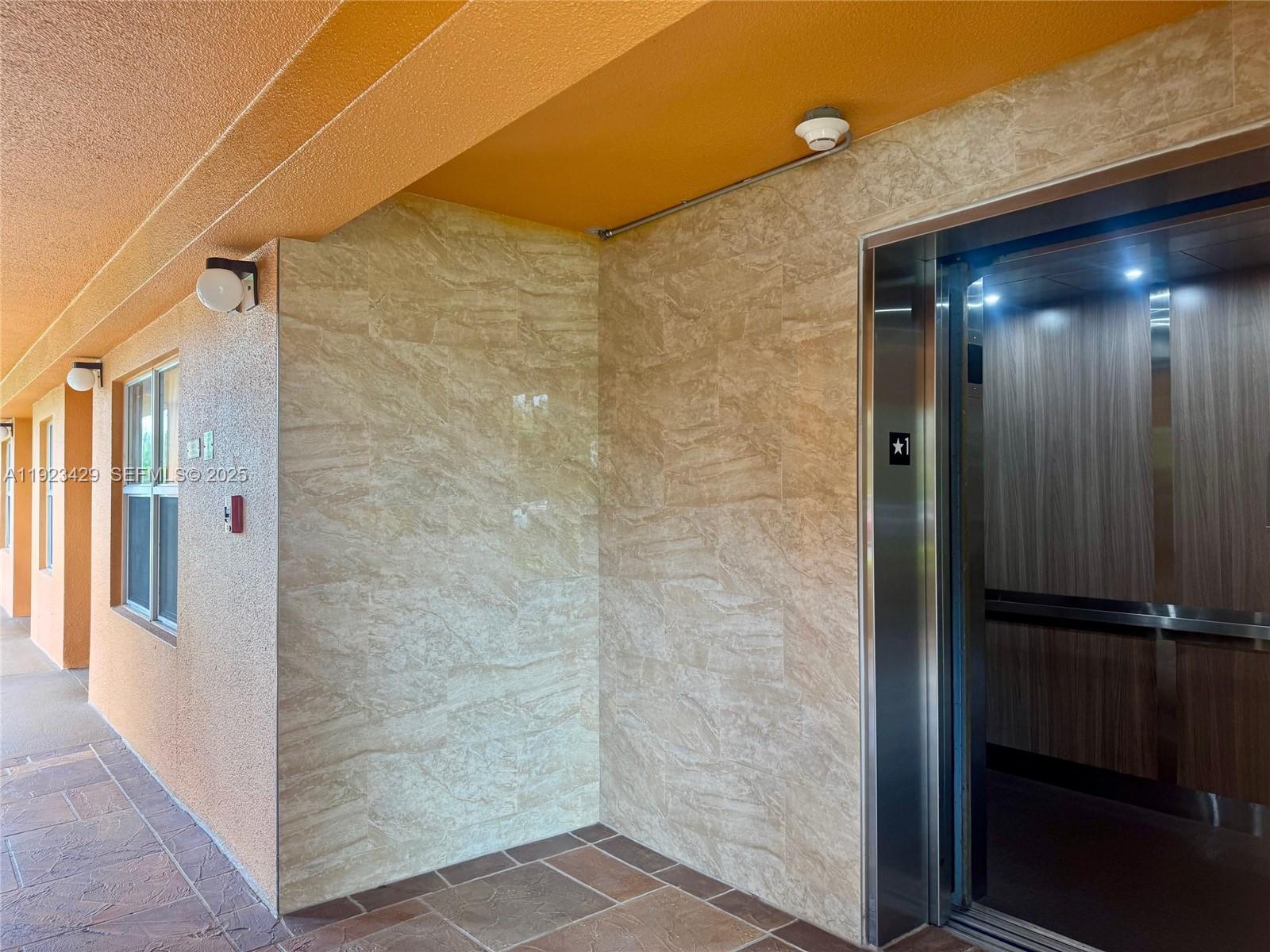 701 Southwest 142nd Avenue, Unit 414S Pembroke Pines, FL 33027 - Photo 5 of 30 a bathroom with a shower