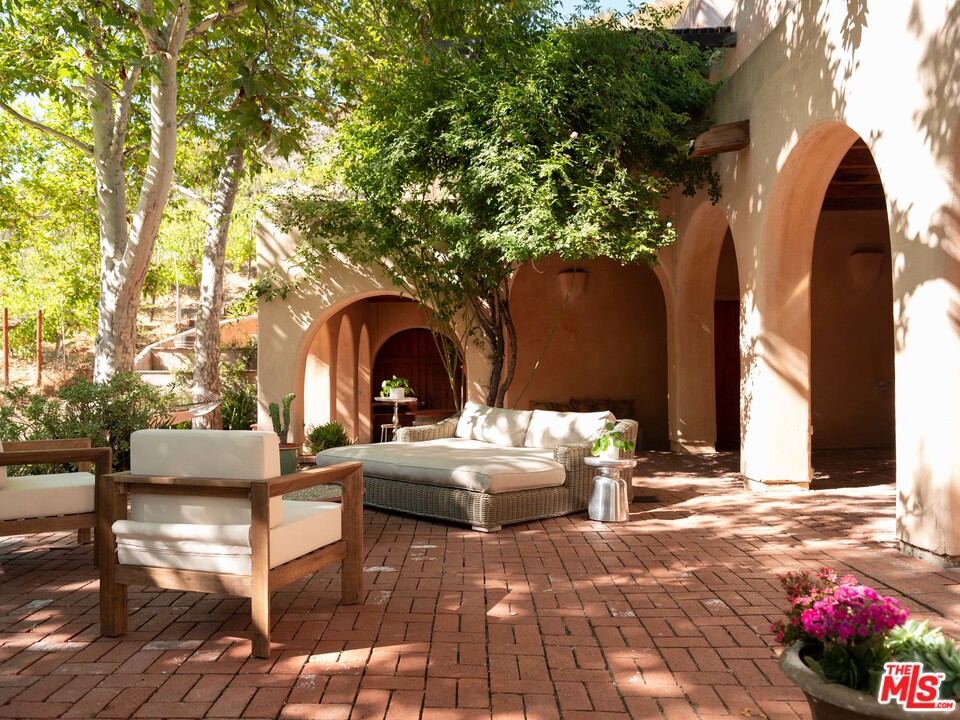 23407 Red Rock Road Topanga, CA 90290 - Photo 24 of 41 a outdoor space with patio furniture