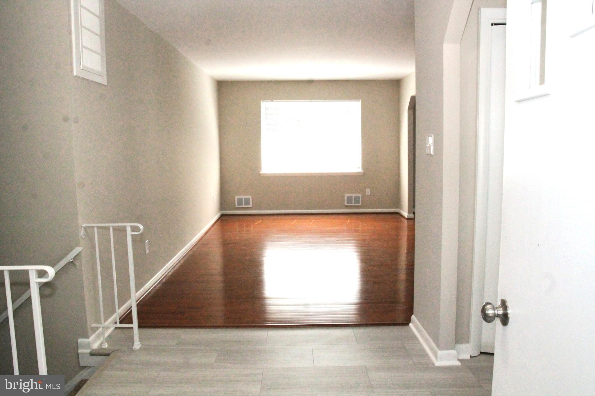 7911 Hart Road Fort Washington, MD 20744 - Photo 3 of 49 a view of entryway with wooden floor