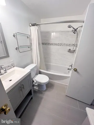 a view of entryway with stairs and wooden floor