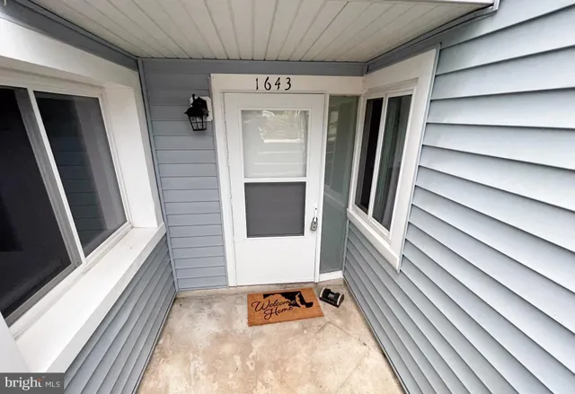 a kitchen with a refrigerator sink and microwave