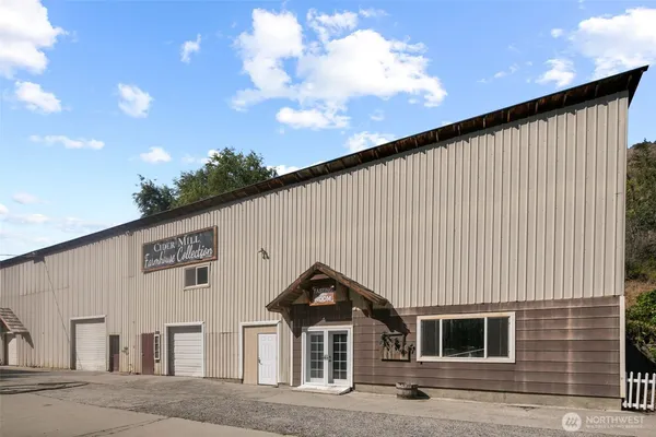 a front view of a house with a garage
