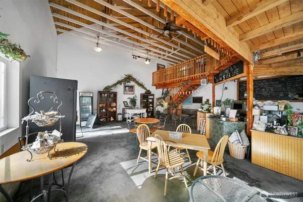 a view of a dining room with furniture