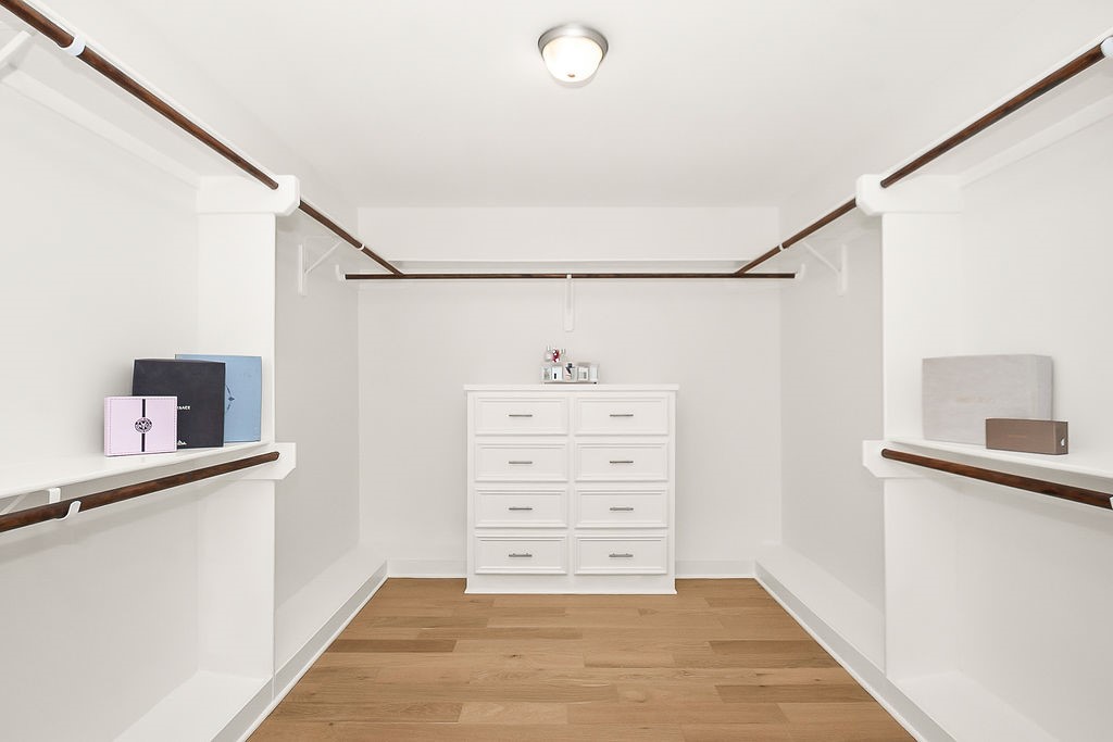1731 Lamonte Lane Houston, TX 77018 - Photo 21 of 40 a view of walk in closet with clothes and shoes