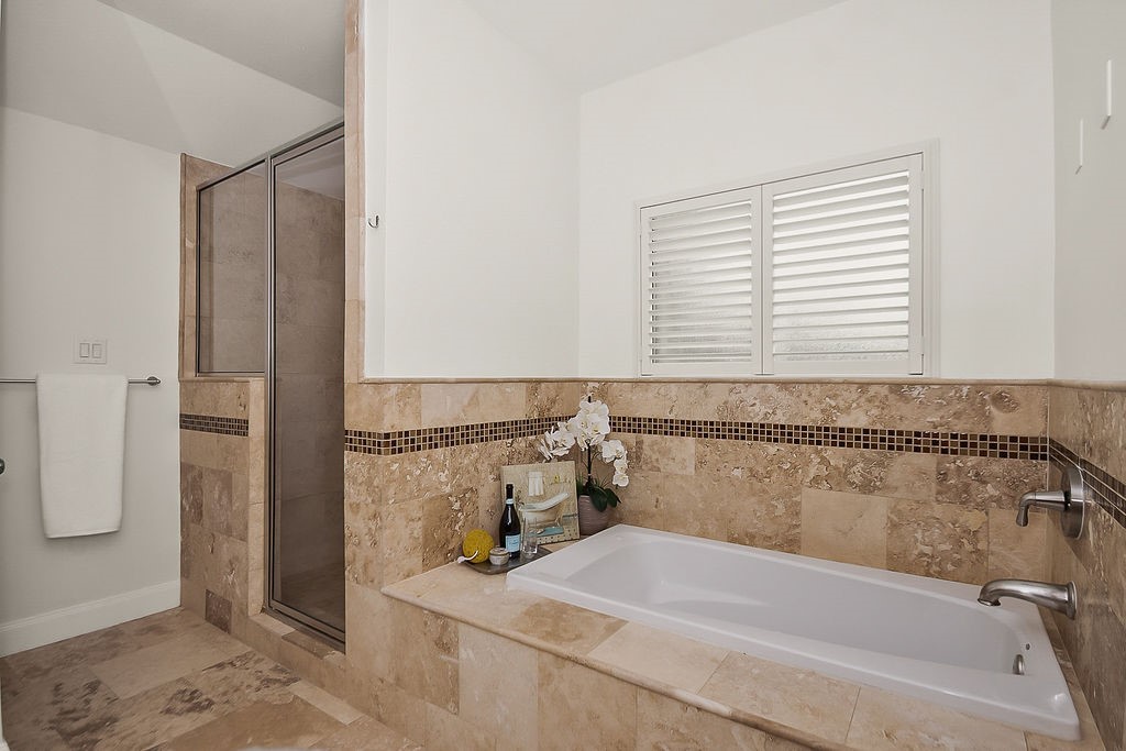 1731 Lamonte Lane Houston, TX 77018 - Photo 23 of 40 a bathroom with a bathtub and a shower