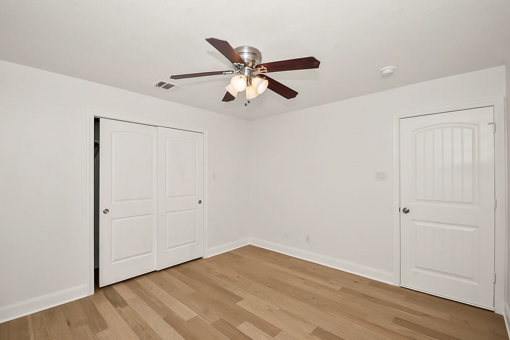 1731 Lamonte Lane Houston, TX 77018 - Photo 30 of 40 a view of empty room with wooden floor