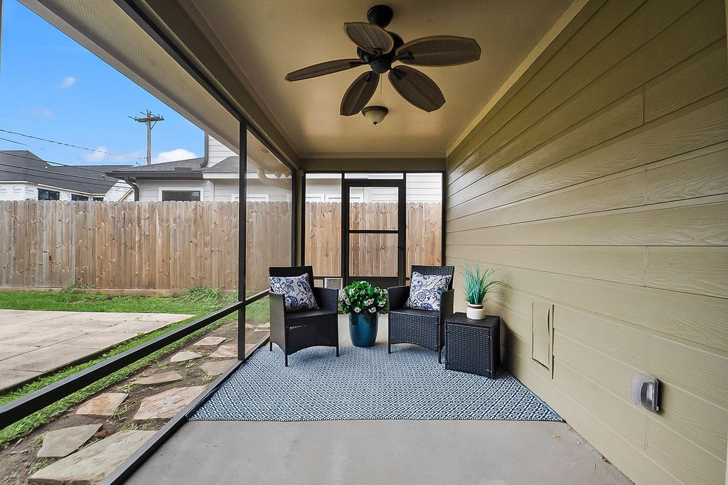 1731 Lamonte Lane Houston, TX 77018 - Photo 32 of 40 a living room with furniture and a large window