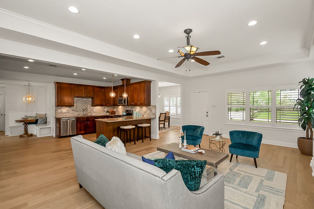 1731 Lamonte Lane Houston, TX 77018 - Photo 7 of 40 a living room with furniture fireplace and a large window