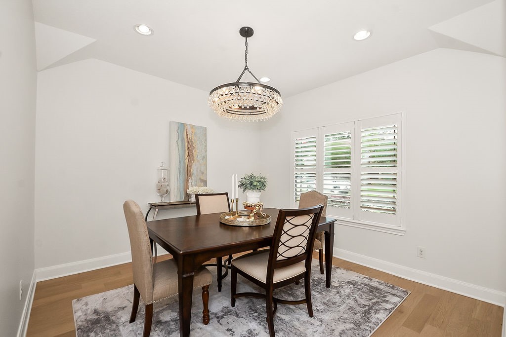 1731 Lamonte Lane Houston, TX 77018 - Photo 10 of 40 a dining room with furniture window and wooden floor