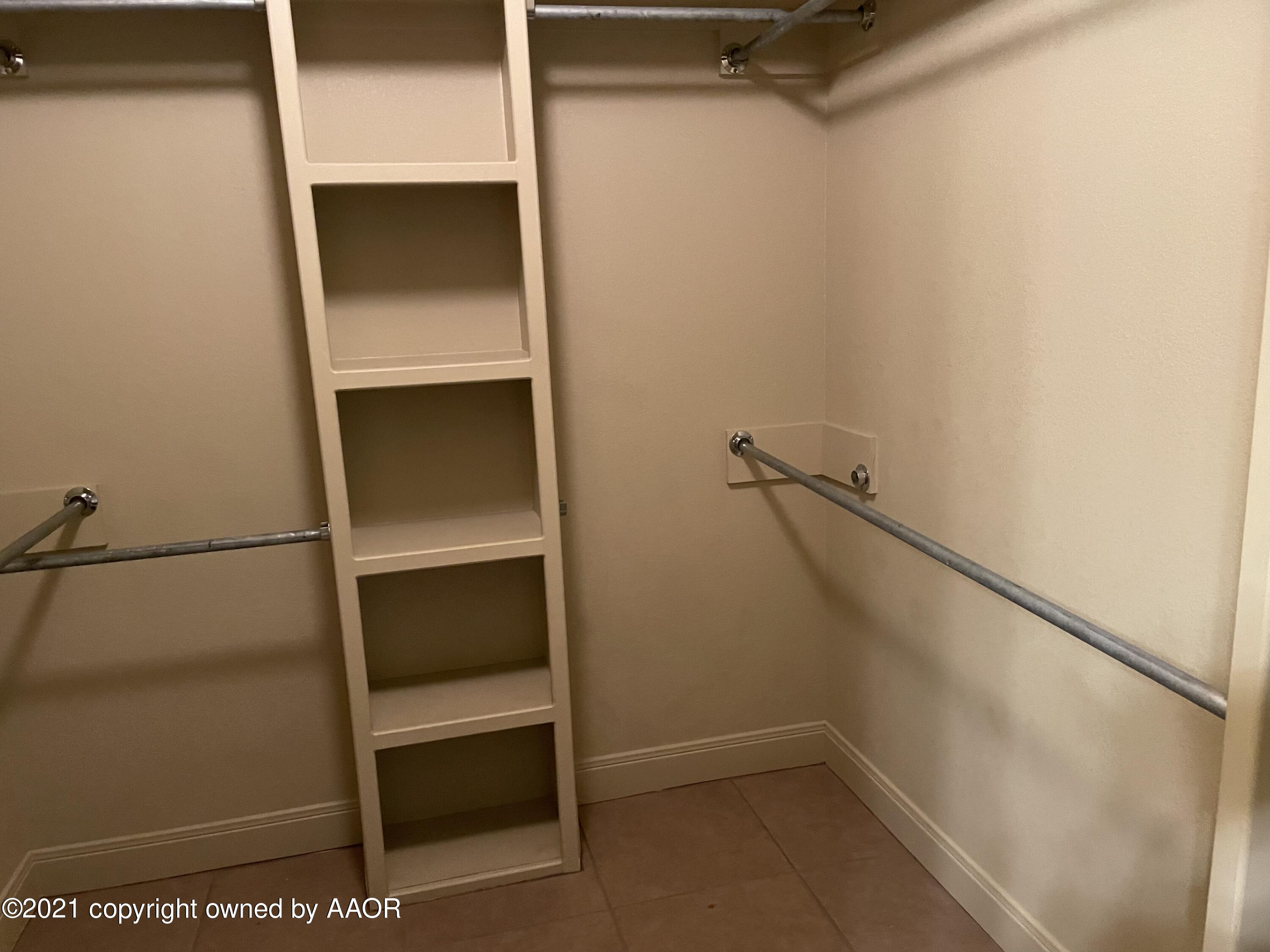 9812 Perry Avenue Amarillo, TX 79119 - Photo 13 of 15 a view of walk in closet