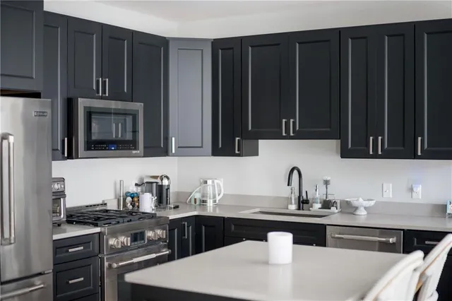 a hotel room with a bed and television