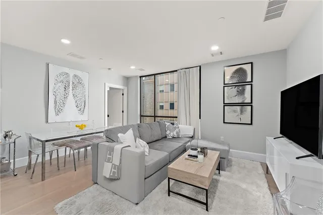 a room with a table and a mirror