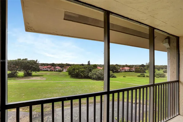 a garden view with a seating space