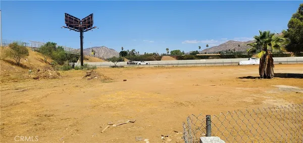 a view of a backyard of a house
