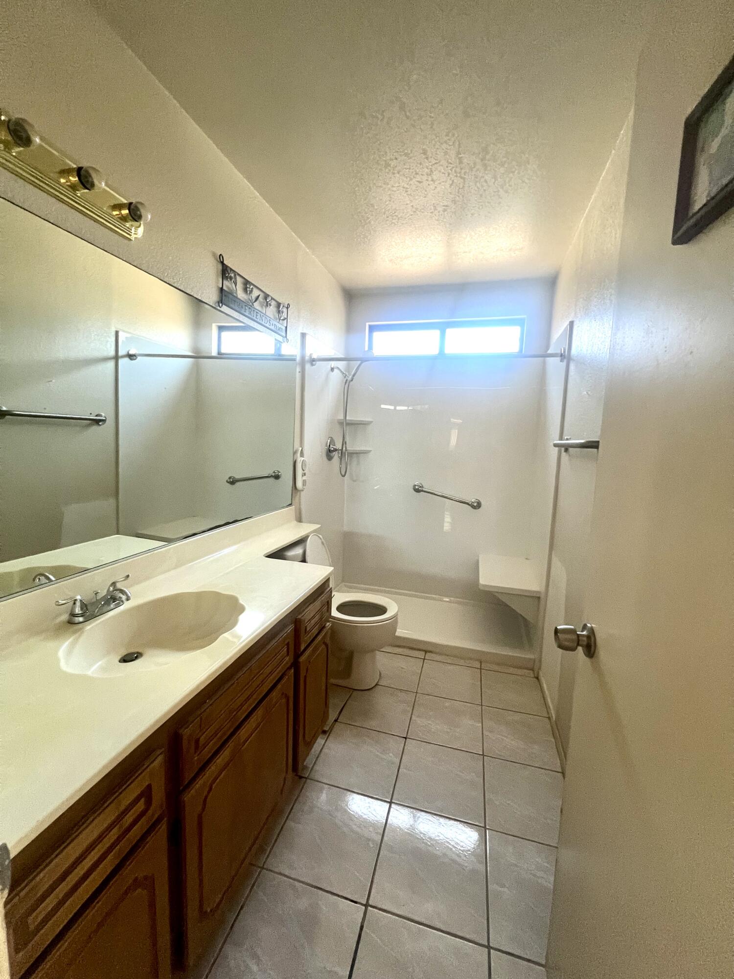 67690 Peineta Road Cathedral City, CA 92234 - Photo 5 of 7 a bathroom with a sink a toilet and shower