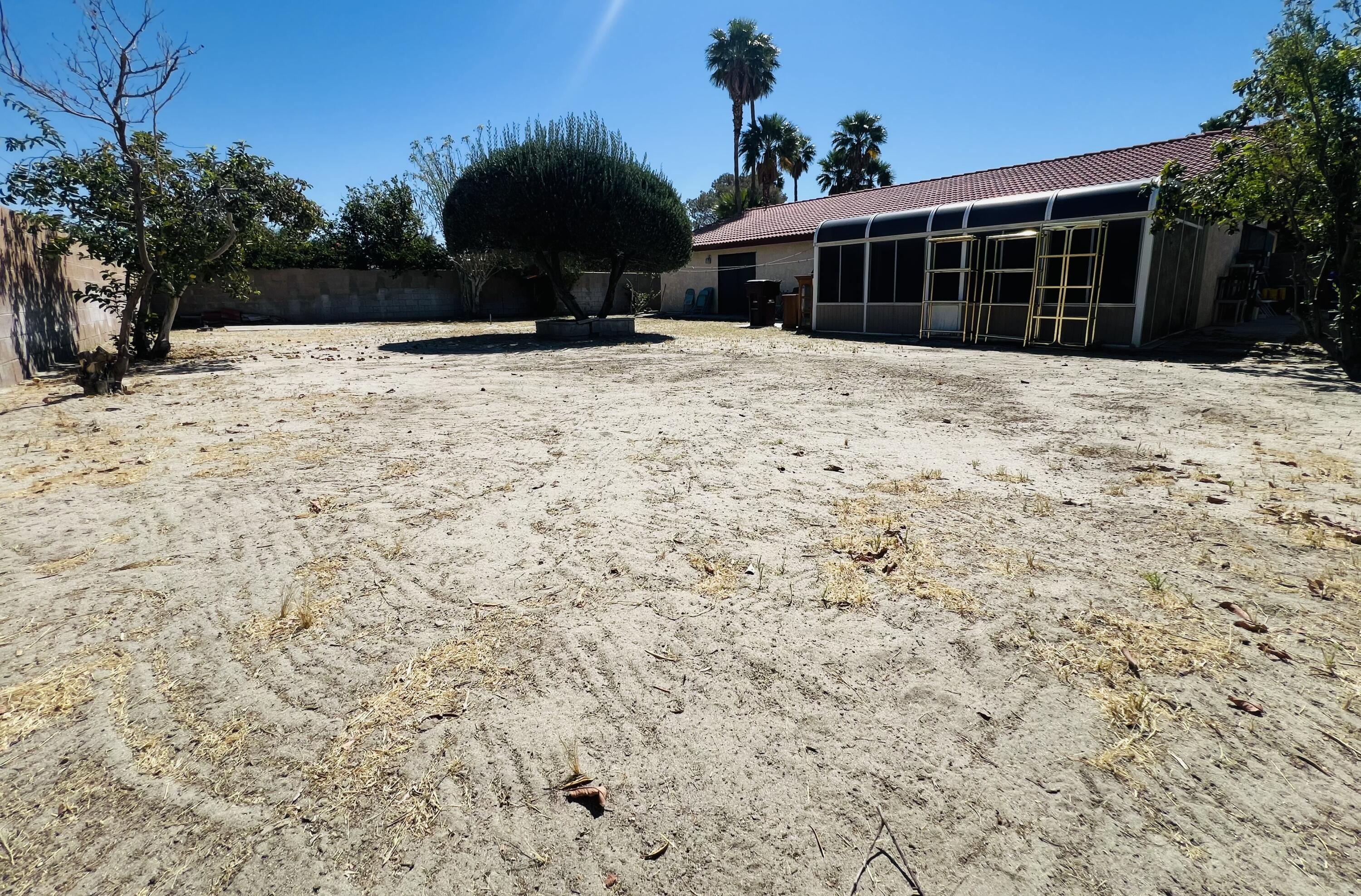 67690 Peineta Road Cathedral City, CA 92234 - Photo 6 of 7 a view of house with a yard