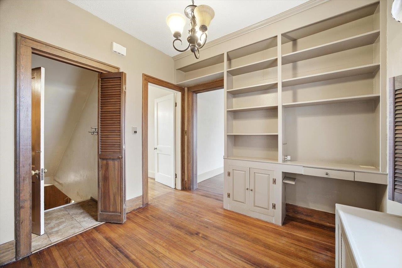 645 Maple Avenue Waynesboro, VA 22980 - Photo 15 of 63 a view of an empty room with a window and wooden floor