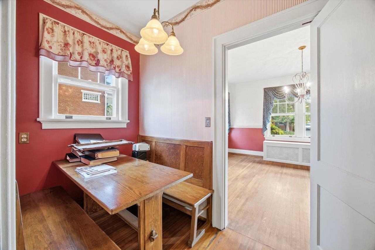 645 Maple Avenue Waynesboro, VA 22980 - Photo 17 of 63 a view of a dining room with furniture a chandelier and wooden floor