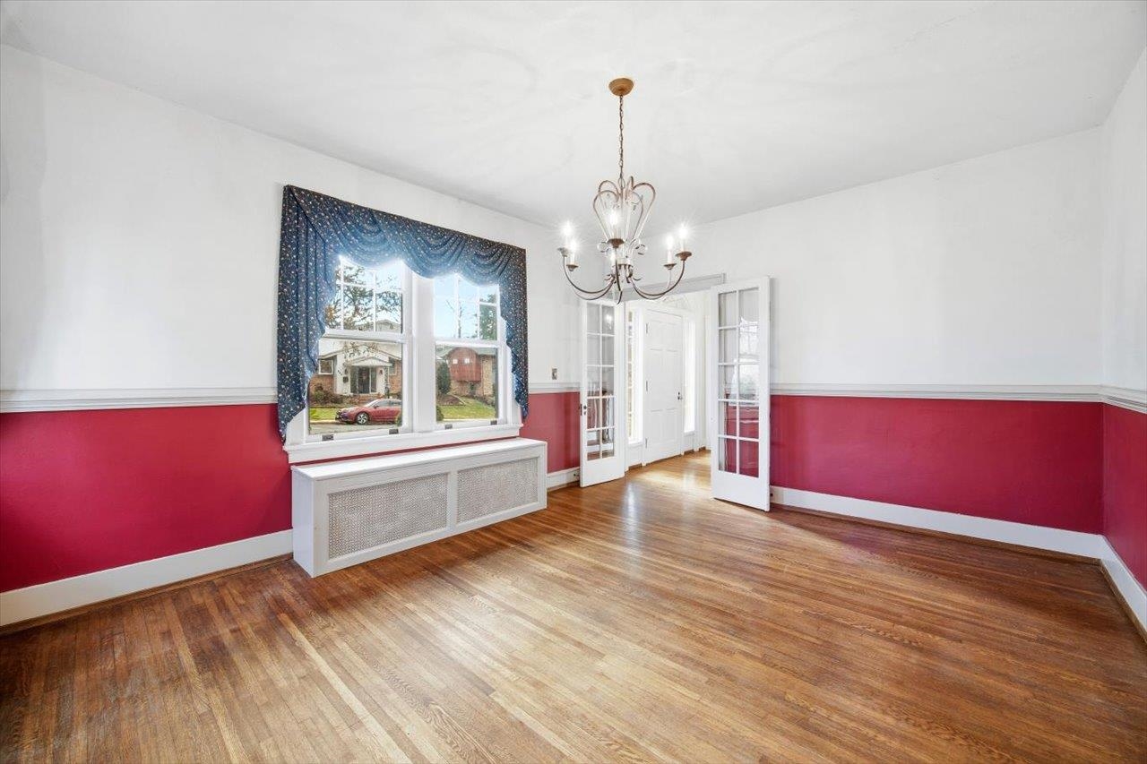 645 Maple Avenue Waynesboro, VA 22980 - Photo 19 of 63 a view of an empty room with window and wooden floor