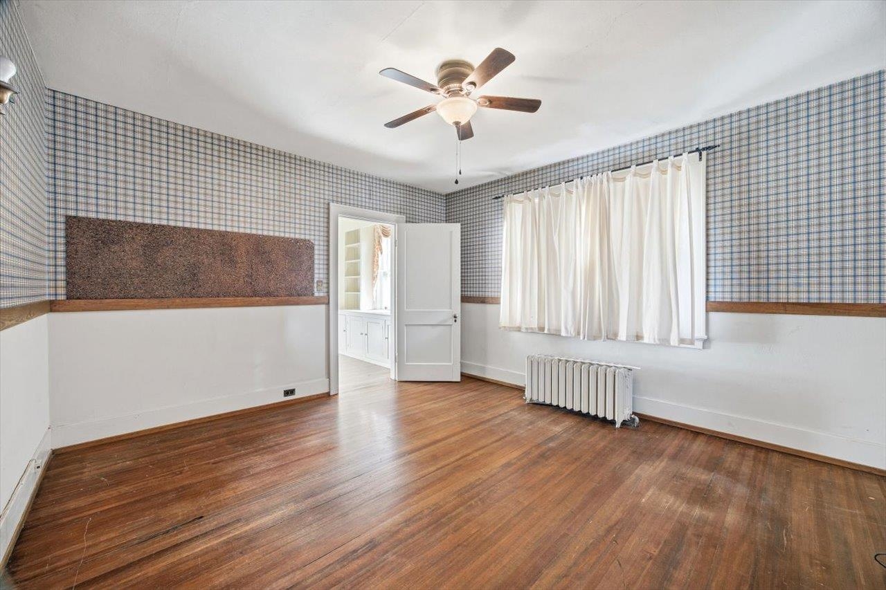 645 Maple Avenue Waynesboro, VA 22980 - Photo 31 of 63 an empty room with wooden floor and windows
