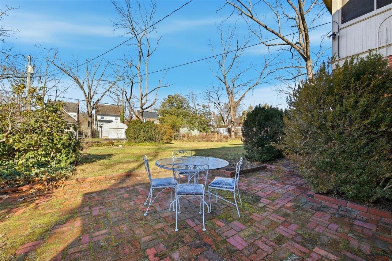 645 Maple Avenue Waynesboro, VA 22980 - Photo 55 of 63 a view of a yard with table and chairs and potted plants