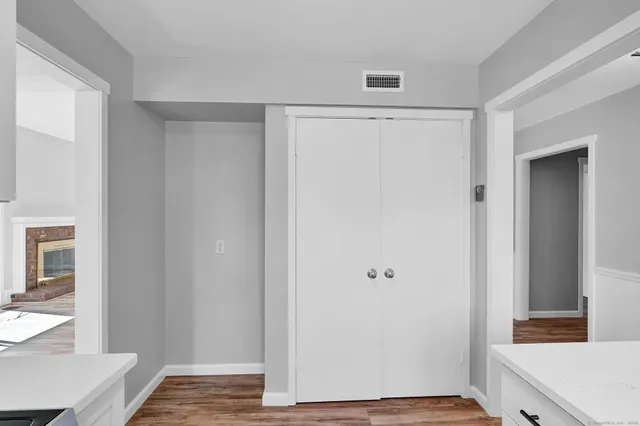 a view of kitchen with wooden floor