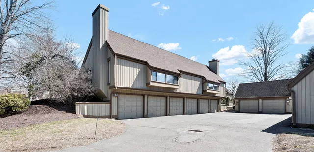 a street view along with residential houses