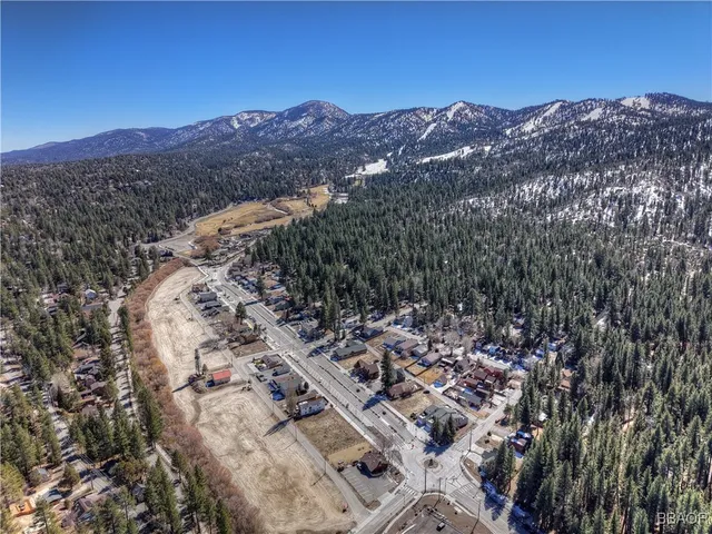 a view of a city with mountain