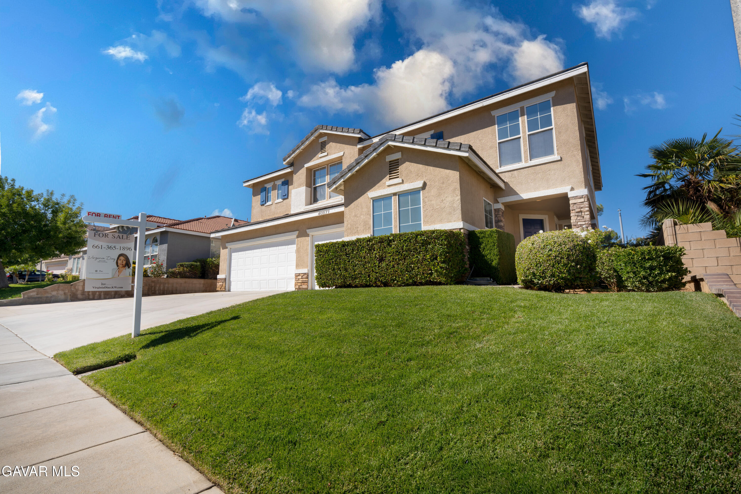 40271 Preston Road Palmdale, CA 93551 - Photo 1 of 38 a front view of a house with a yard and garage