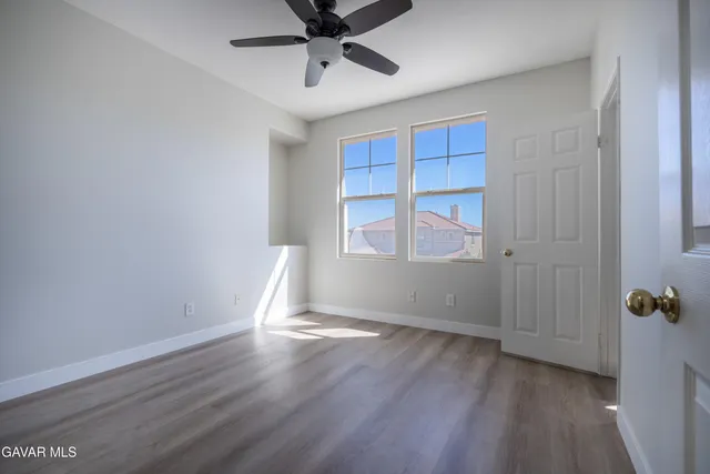 a view of an empty walk in closet