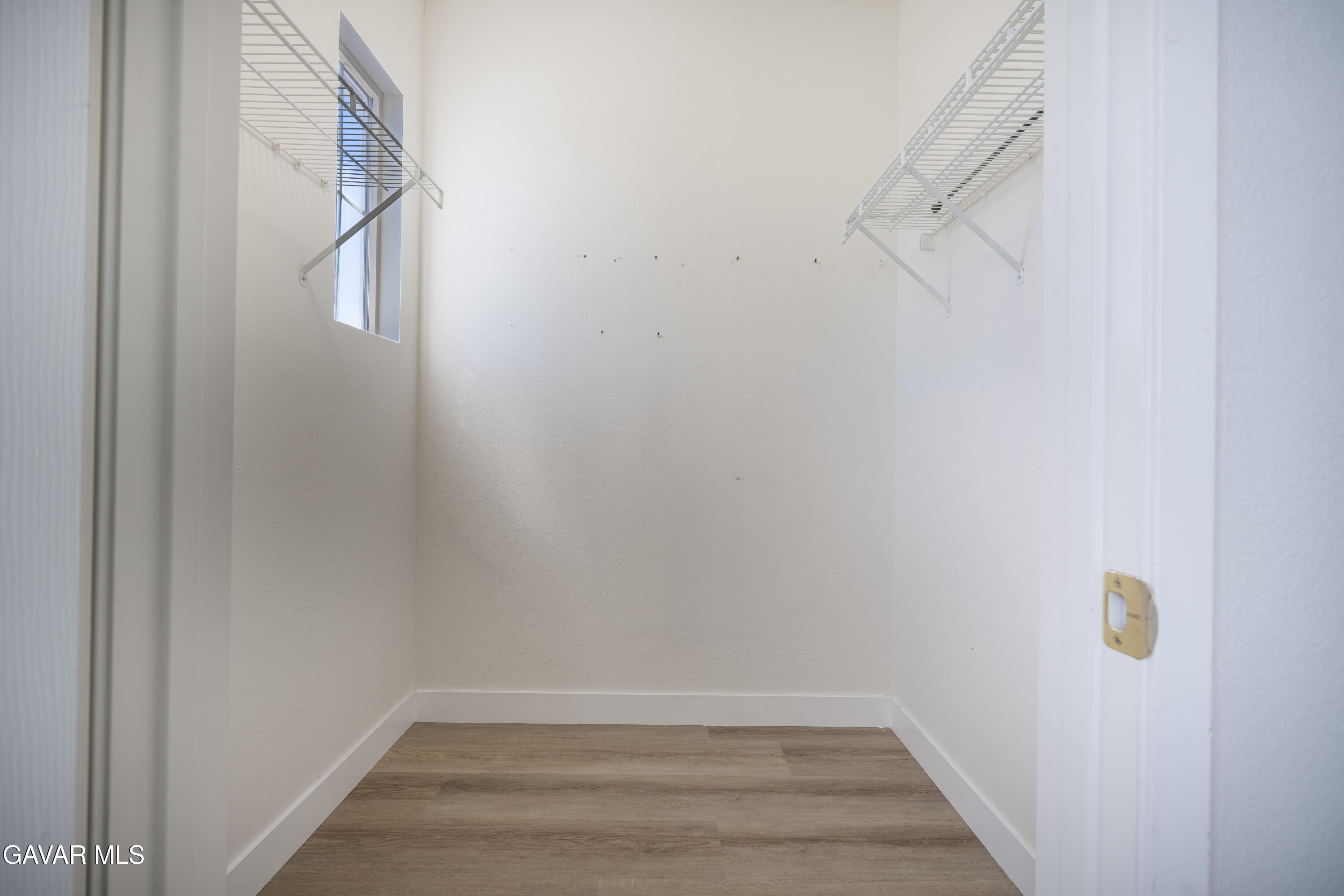 40271 Preston Road Palmdale, CA 93551 - Photo 28 of 38 a view of an empty walk in closet