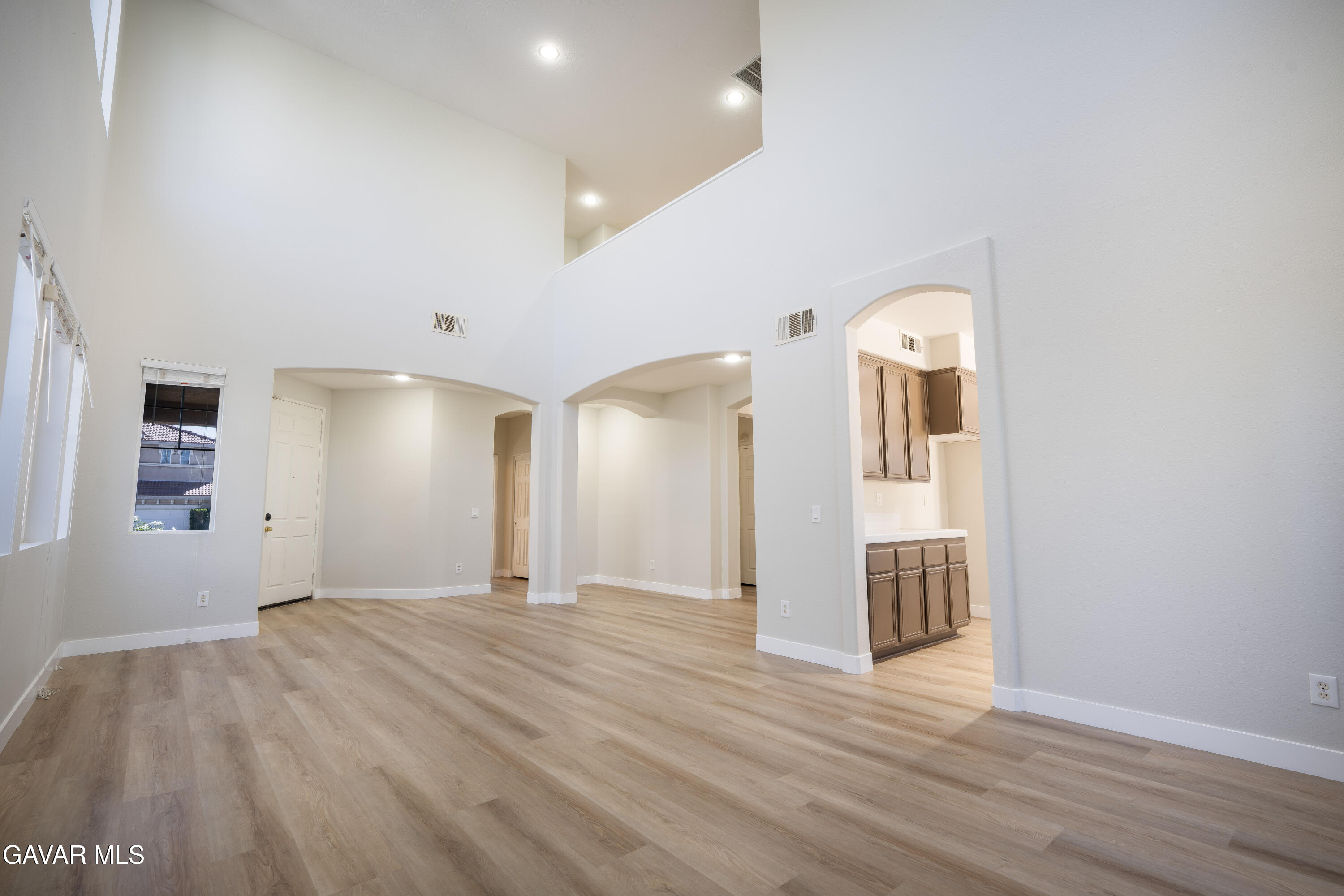 40271 Preston Road Palmdale, CA 93551 - Photo 6 of 38 a view of a livingroom with wooden floor