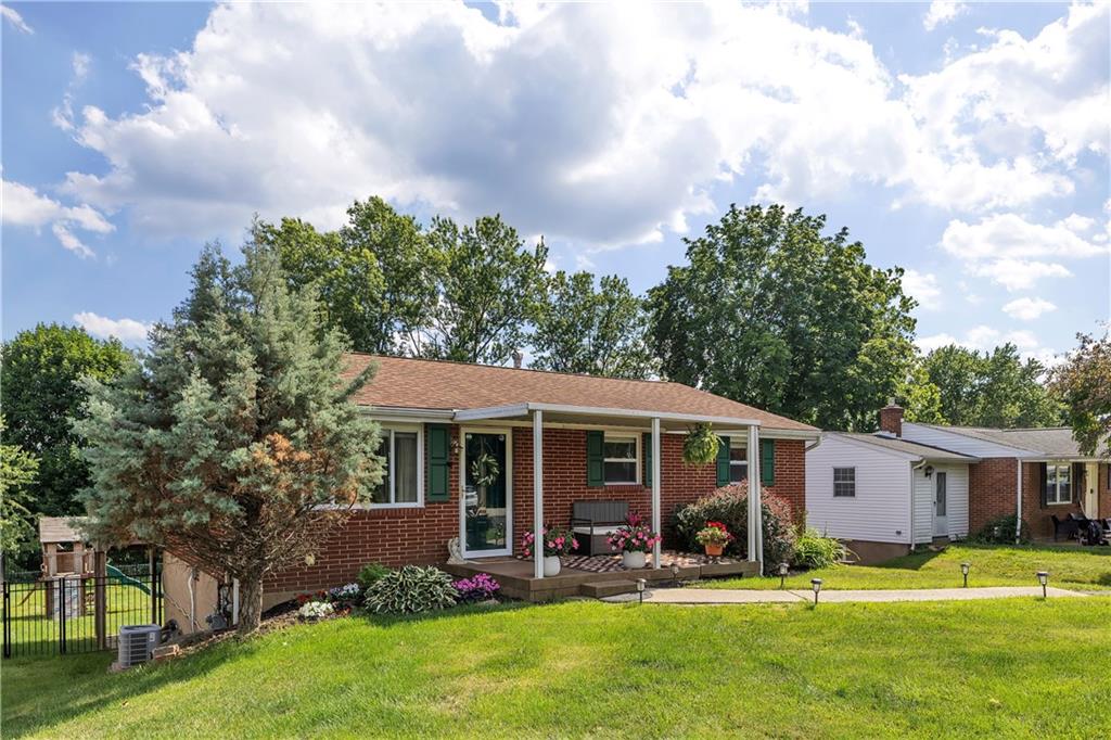 212 Seanor Road Irwin, PA 15642 - Photo 2 of 33 All Brick Ranch Home with Level Covered Entry, Ample Parking, and Fully Fenced Yard!