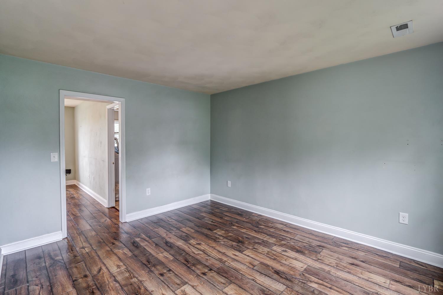 1057 Old Trail Road Forest, VA 24551 - Photo 6 of 49 a view of a room with wooden floor