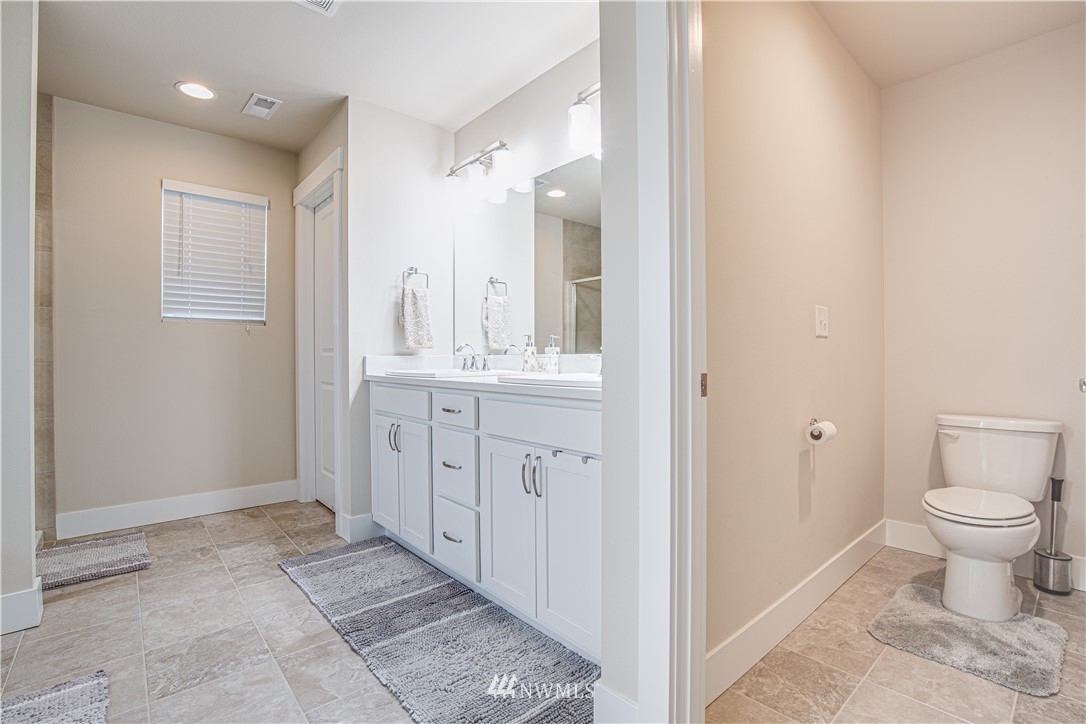 17626 115th Place Southeast Renton, WA 98055 - Photo 15 of 18 a view of a bathroom with a sink and a toilet
