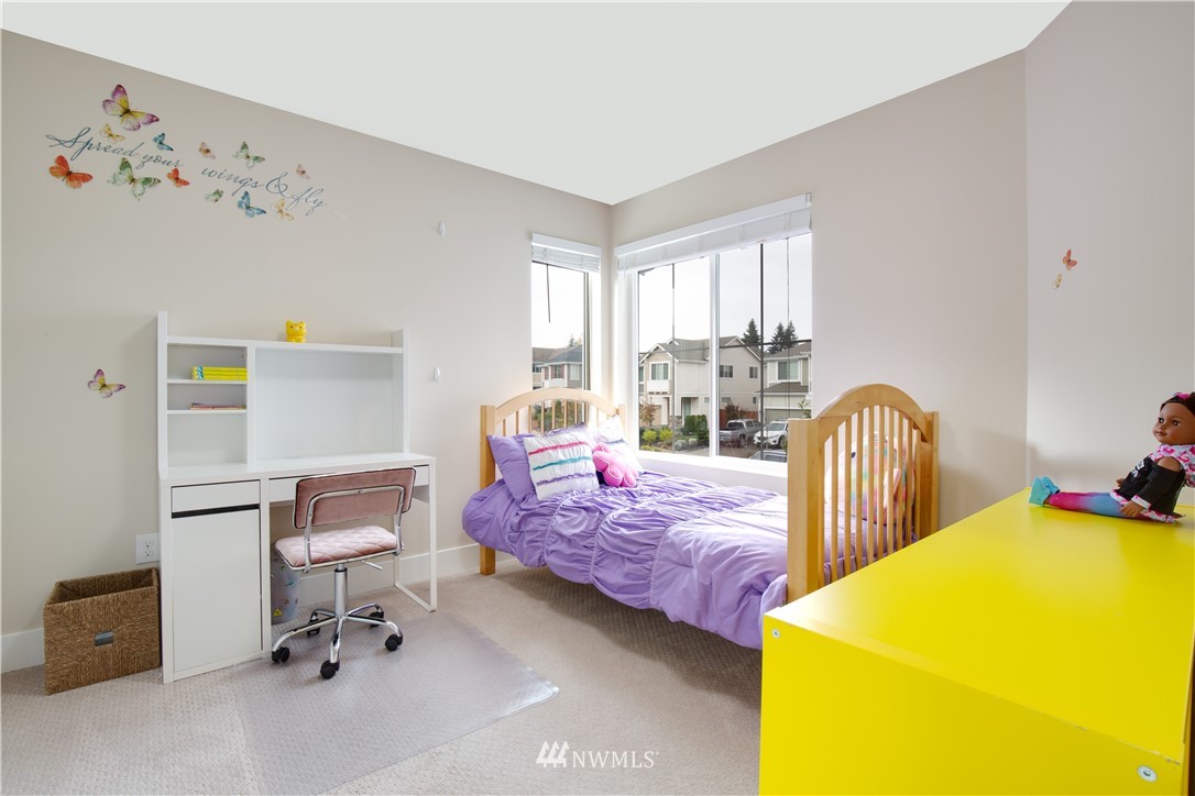 17626 115th Place Southeast Renton, WA 98055 - Photo 16 of 18 a bedroom with 2 bed and wooden floor