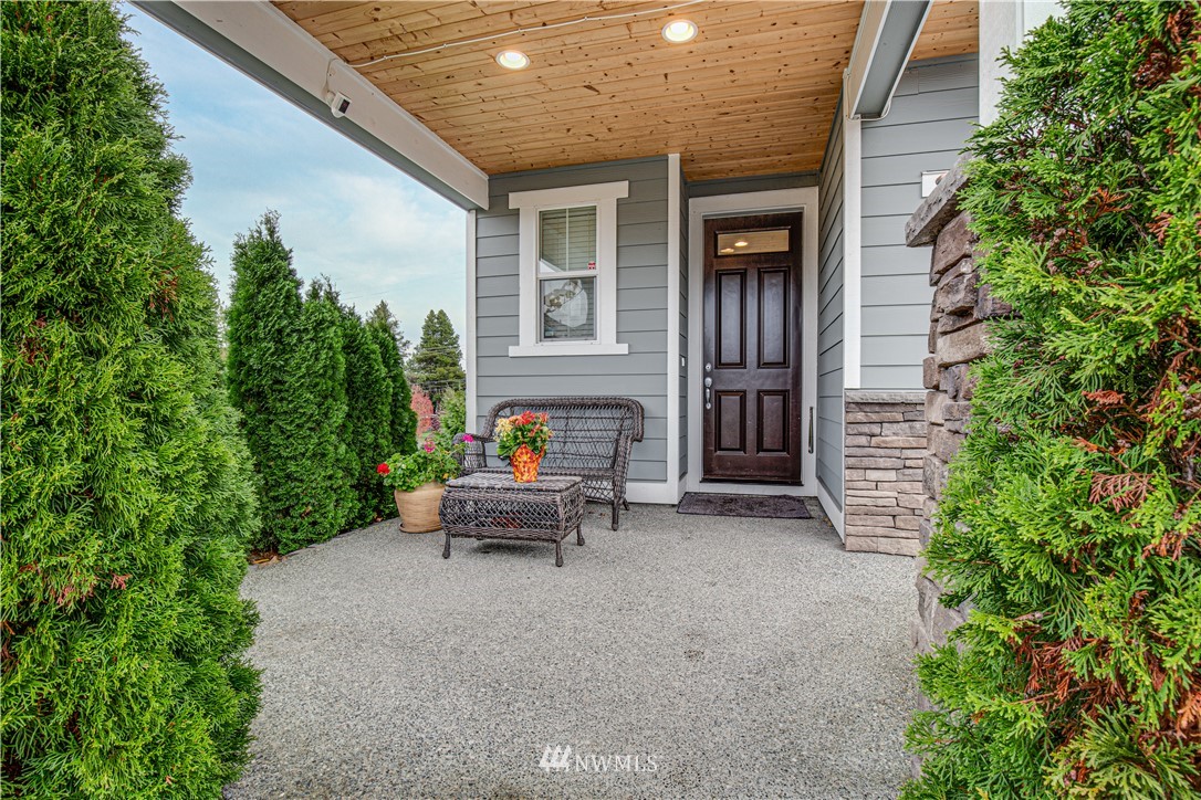 17626 115th Place Southeast Renton, WA 98055 - Photo 18 of 18 a view of a patio with table and chairs and potted plants