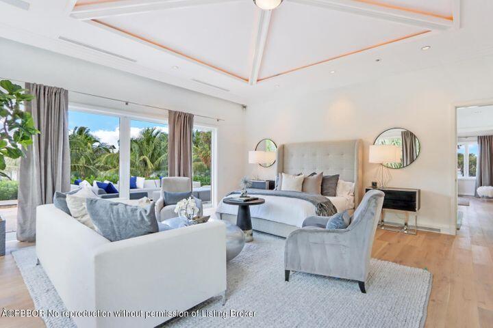 215 Indian Road Palm Beach, FL 33480 - Photo 11 of 32 a living room with fireplace furniture and a large window