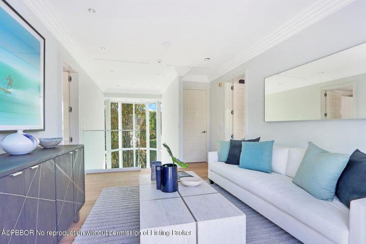 215 Indian Road Palm Beach, FL 33480 - Photo 13 of 32 a living room with furniture and a large window