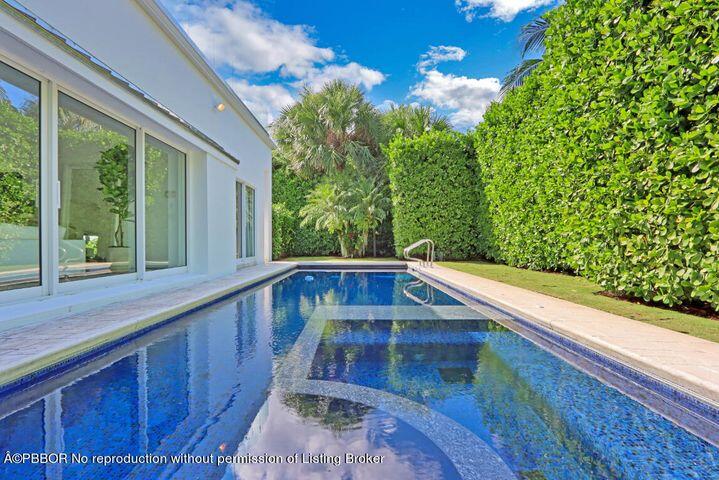 215 Indian Road Palm Beach, FL 33480 - Photo 30 of 32 a view of balcony with wooden floor and fence