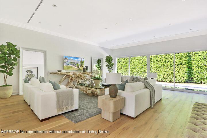 215 Indian Road Palm Beach, FL 33480 - Photo 3 of 32 a living room with furniture and a large window